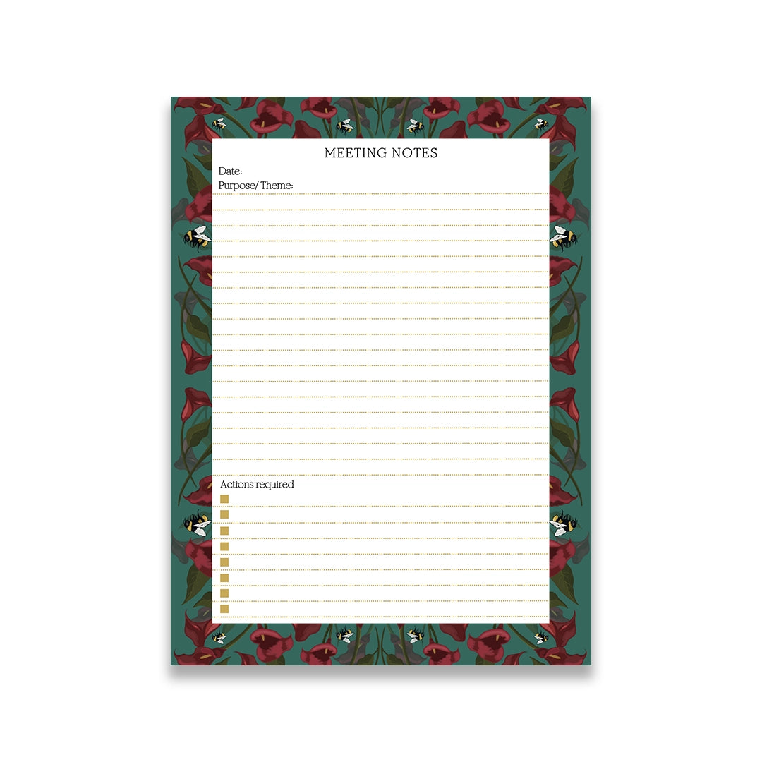 A floral patterned meeting notepad with calla lily designs in green, red, and white.