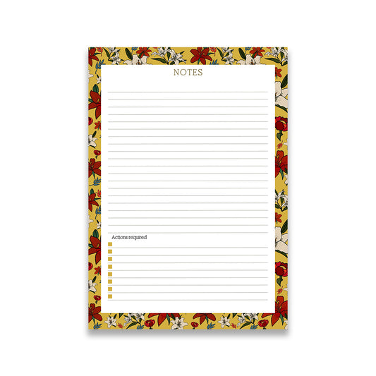 A small desk notepad with yellow lily flower designs on the borders, lined paper for notes, and a to-do list column at the bottom.
